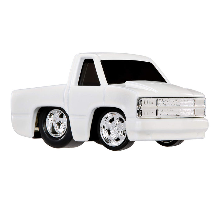 White toy truck with chrome details on a white background