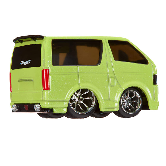 Green van with large wheels on a white background