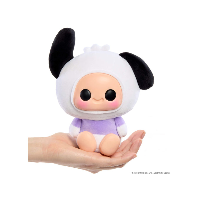 Plush toy with a white face and black ears held in a hand on a white background