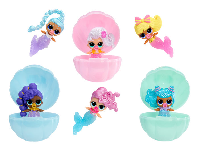 Six colorful mermaid-themed dolls three in shells on a white background