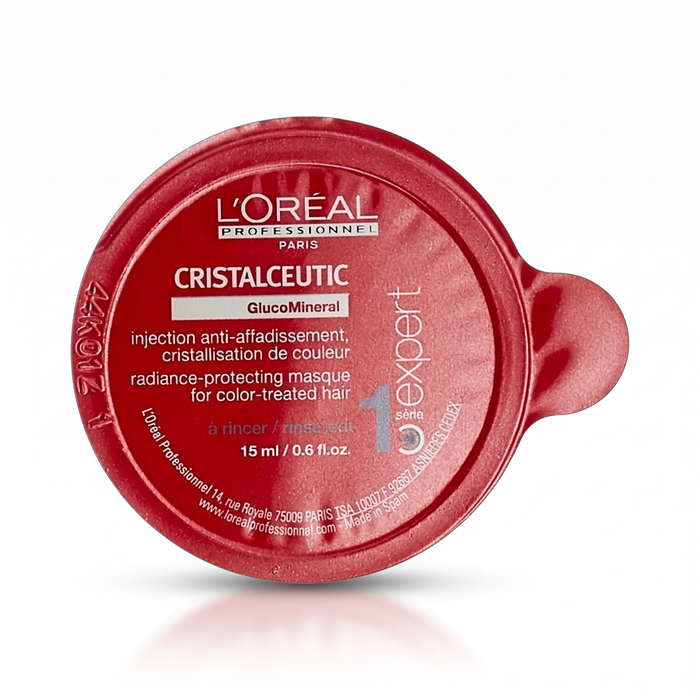 L'Oréal Professionnel Paris Cristaleucptic GlucoMineral injection anti-affadissement for color-treated hair, in a red 15 ml round applicator cap on a white background.