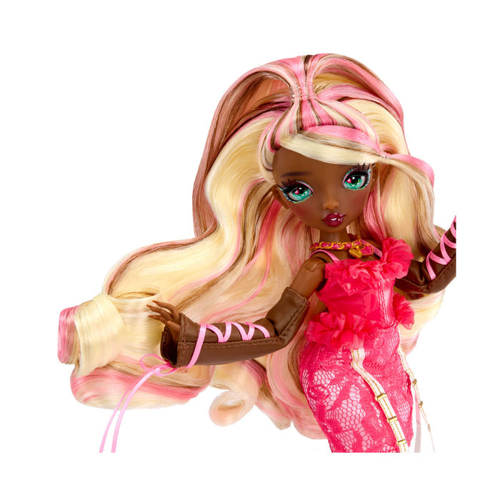 Fashion doll with long blonde and pink hair, wearing a pink dress and brown arm accessory, isolated on a white background.