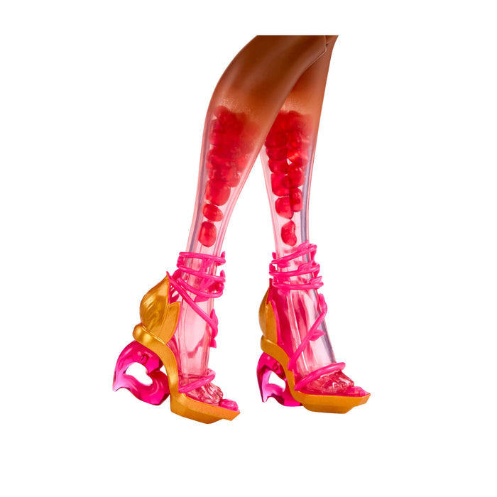 Doll’s legs are transparent with red ‘bubbles’ inside, wearing metallic gold sculpted heels with pink lace-up straps against a plain white background.
