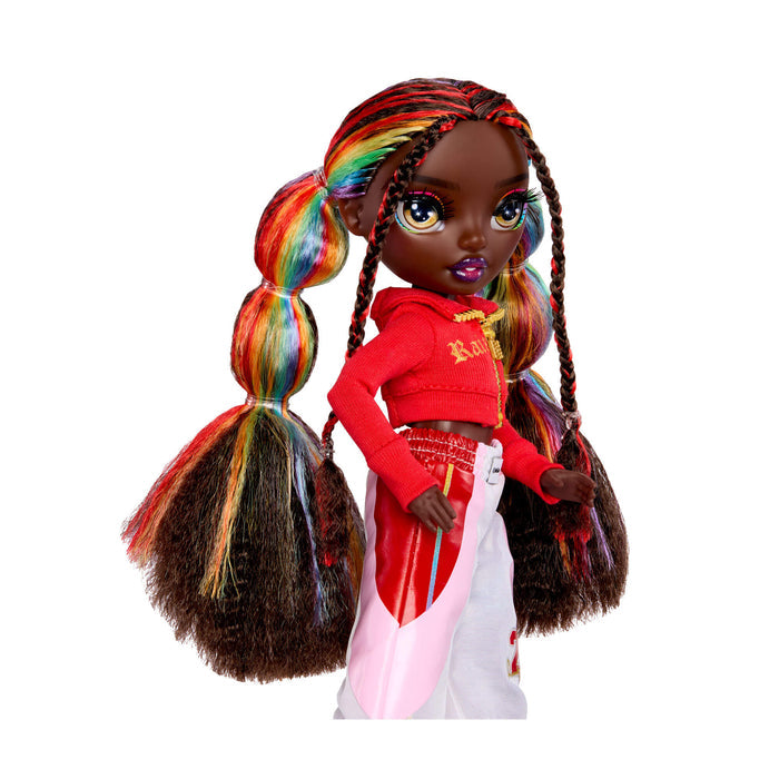 Doll with rainbow hair on a white background